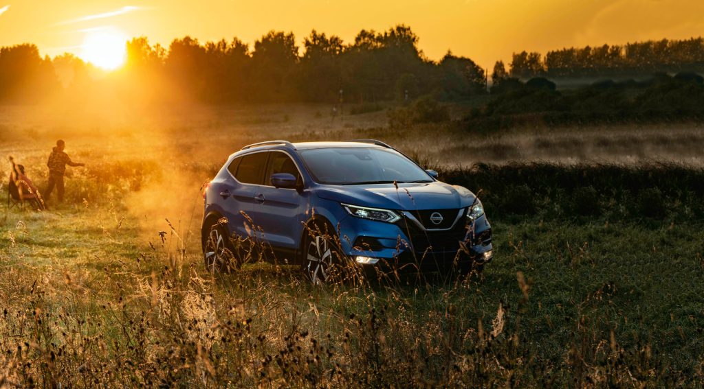 Blue Car in the woods | Portage Cars